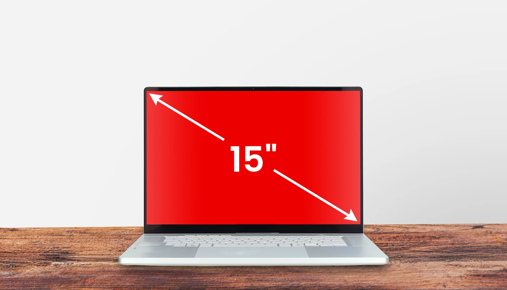 PC portable avec une flèche indiquant la diagonale d'écran de 15 pouces